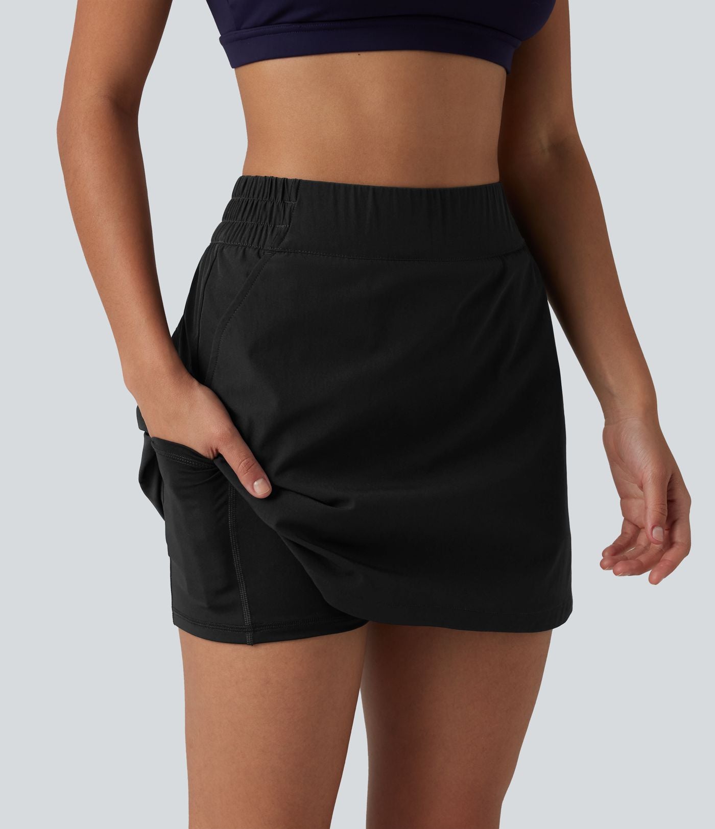 Jupe mini de randonnée 2-en-1 taille haute ourlet arrondi avec poches