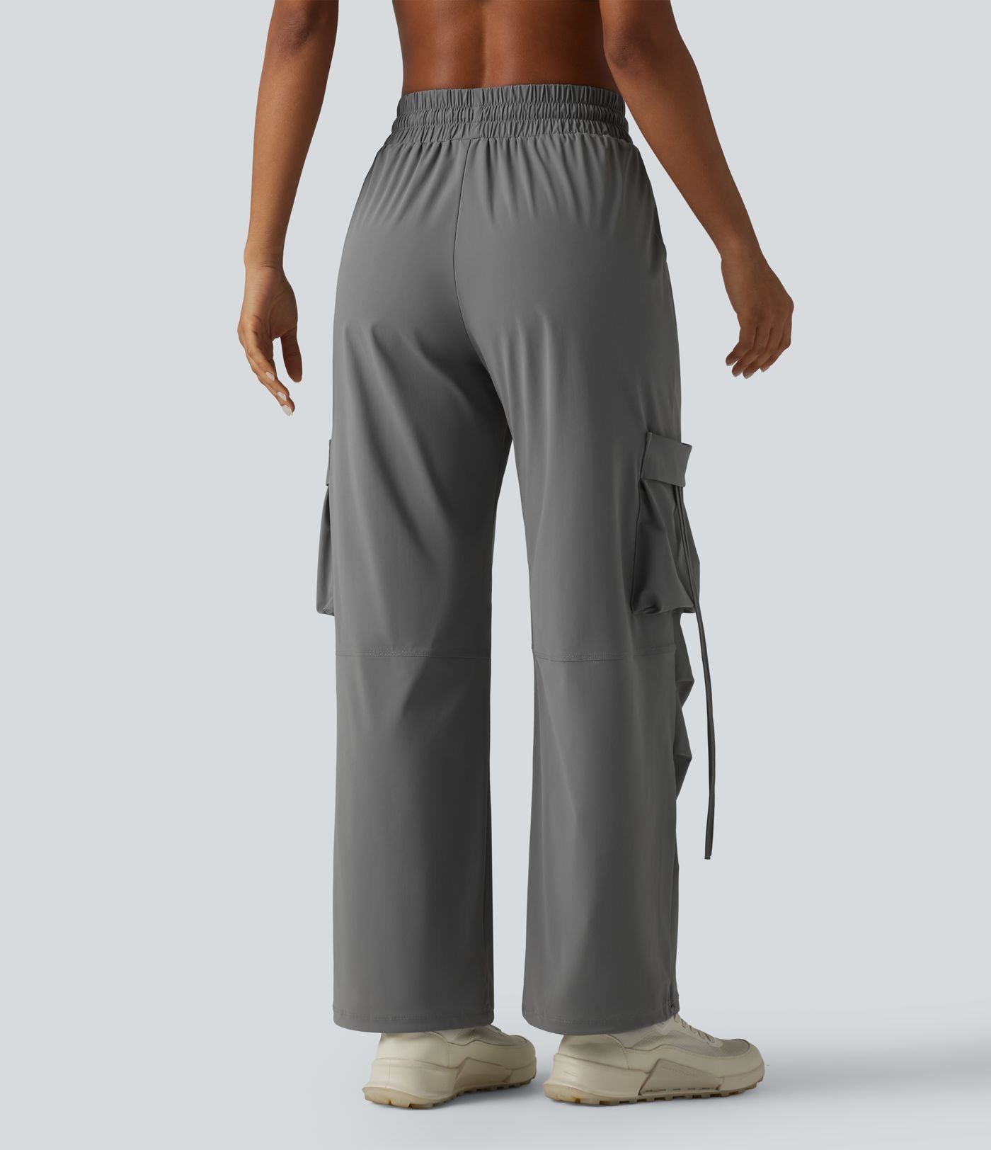 Pantalon cargo large fluide d'entraînement taille haute avec cordon de serrage, séchage rapide, à effet frais InstantCool et poches, protection solaire UPF40+