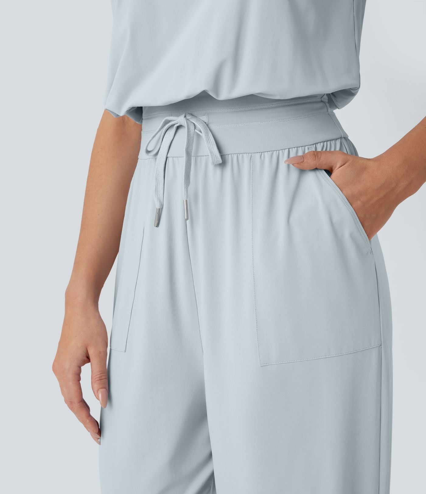 Combinaison de yoga col bateau sans manches dos nu avec découpes et poches latérales à cordon de serrage effet frais InstantCool, protection solaire UPF50+