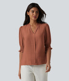 Blouse décontractée à col en V et manches courtes bouffantes