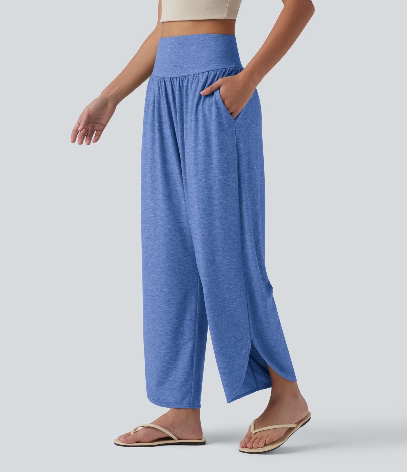 Pantalon décontracté taille haute gainant avec ourlet arrondi et poches