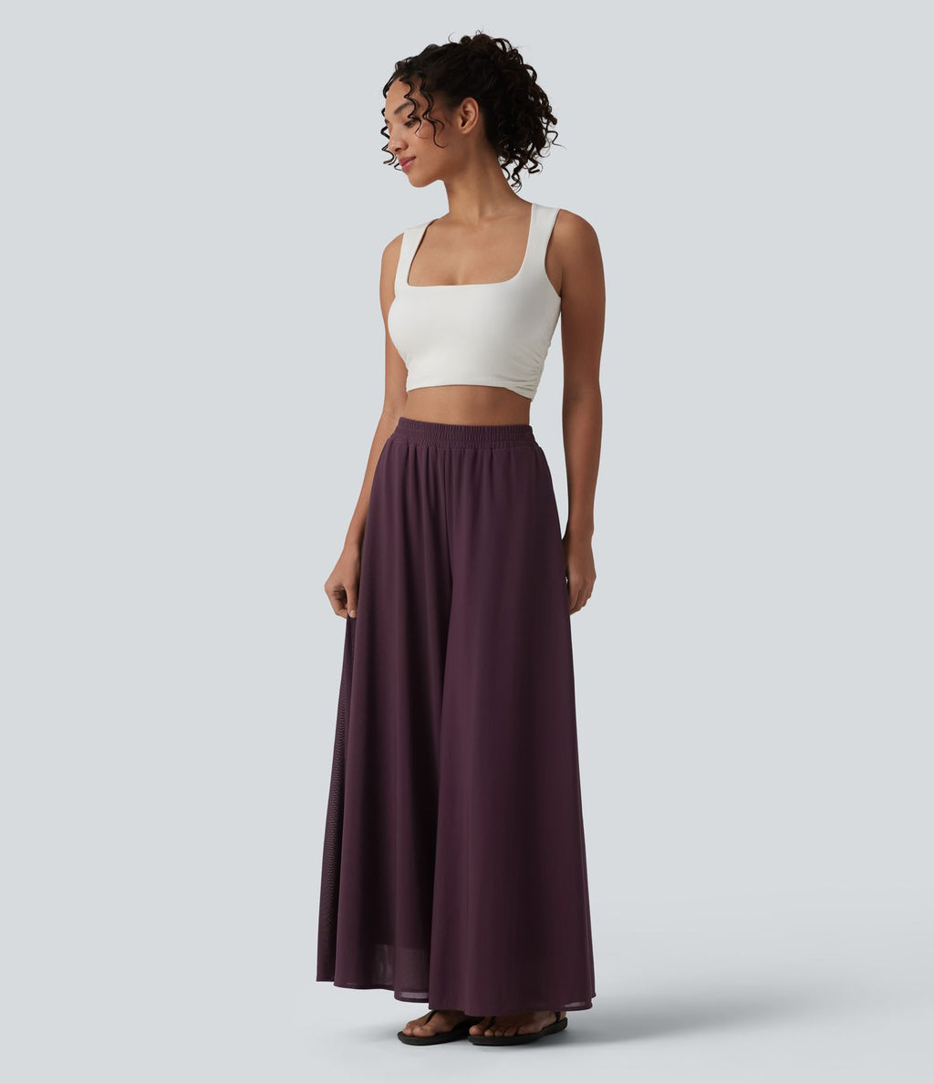 Pantalon fluide et ample avec superposition en mesh, poches latérales et taille haute