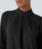 Blouse de travail à col montant, plis, boutons au dos et manches longues