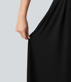 Robe longue fluide décontractée sans manches décolleté en cœur bretelles croisées avec lien dans le dos et poches
