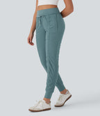 Pantalon jogging de voyage taille haute avec cordon de serrage, coupe fuselée et poches latérales zippées