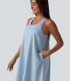 Robe midi resort fluide à carreaux vichy dos nu dos nageur coupe asymétrique avec soutien-gorge intégré et poches