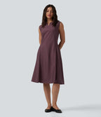 Robe mi-longue évasée de travail col cranté sans manches avec poches