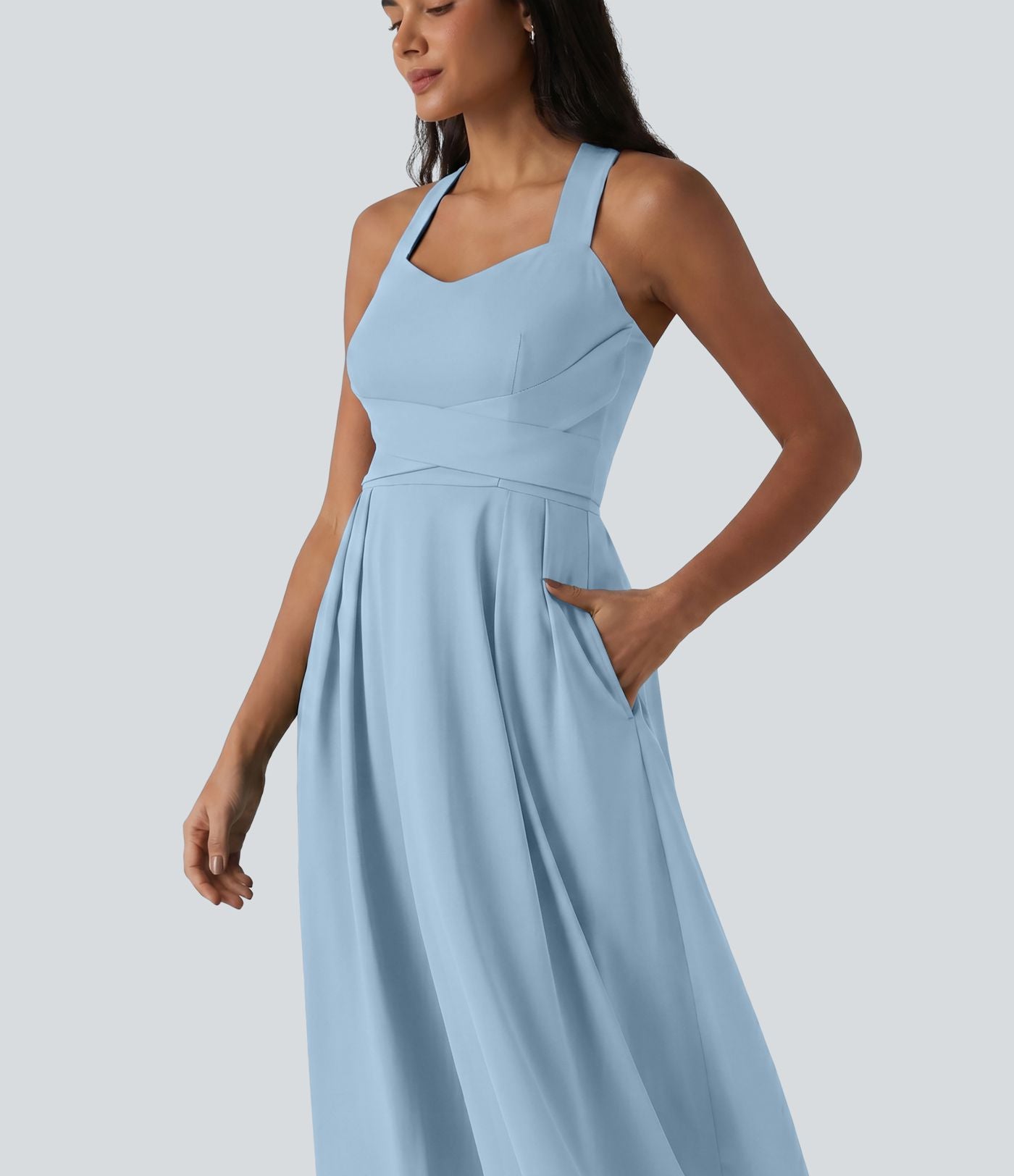 Robe midi fluide sans manches décolleté cœur avec bretelles croisées, nœud dans le dos et poches