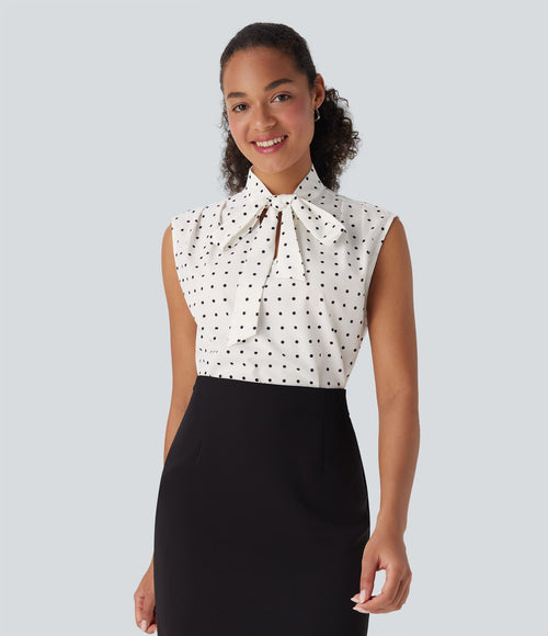 Chemise de travail sans manches à pois avec nœud devant