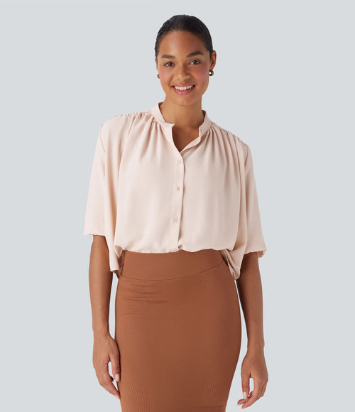 Blouse aspect lin col rond, manches mi-longues, boutonnée avec ourlet arrondi pour la détente
