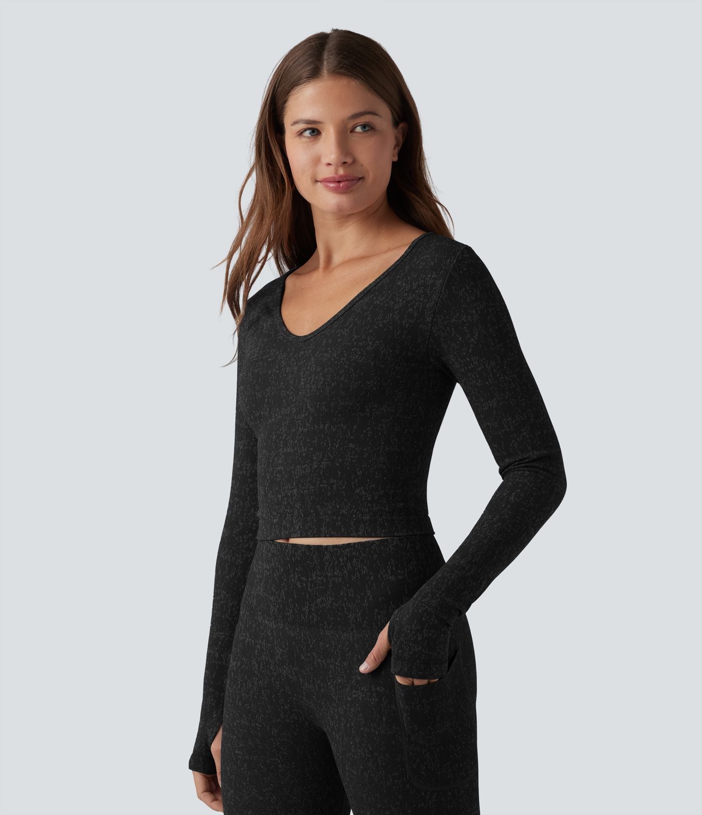 Top de sport yoga court OneForm Seamless Flow col V à manches longues avec passage de pouce