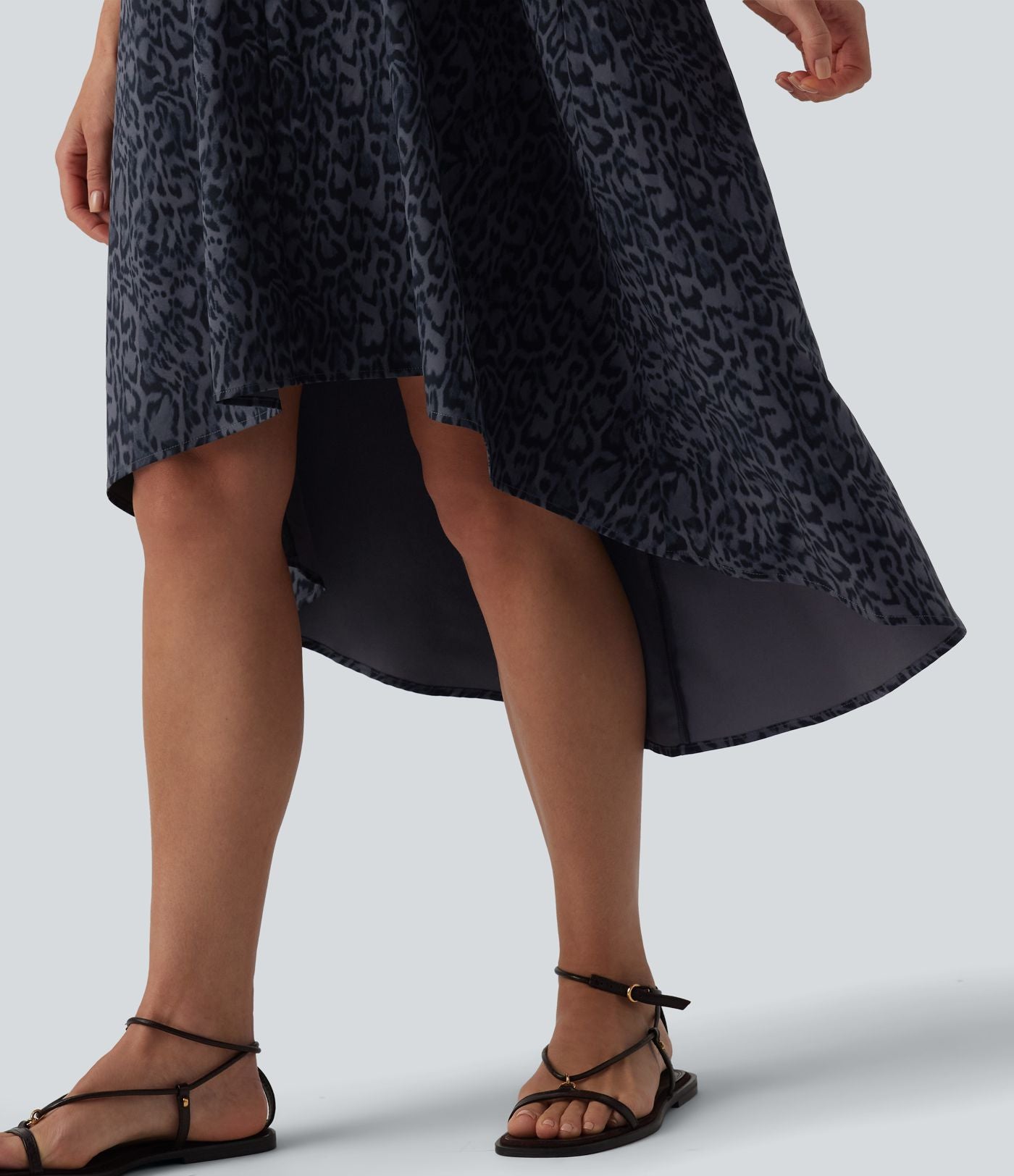 Robe mi-longue fluide station balnéaire dos nageur sans manches asymétrique imprimé léopard avec poches