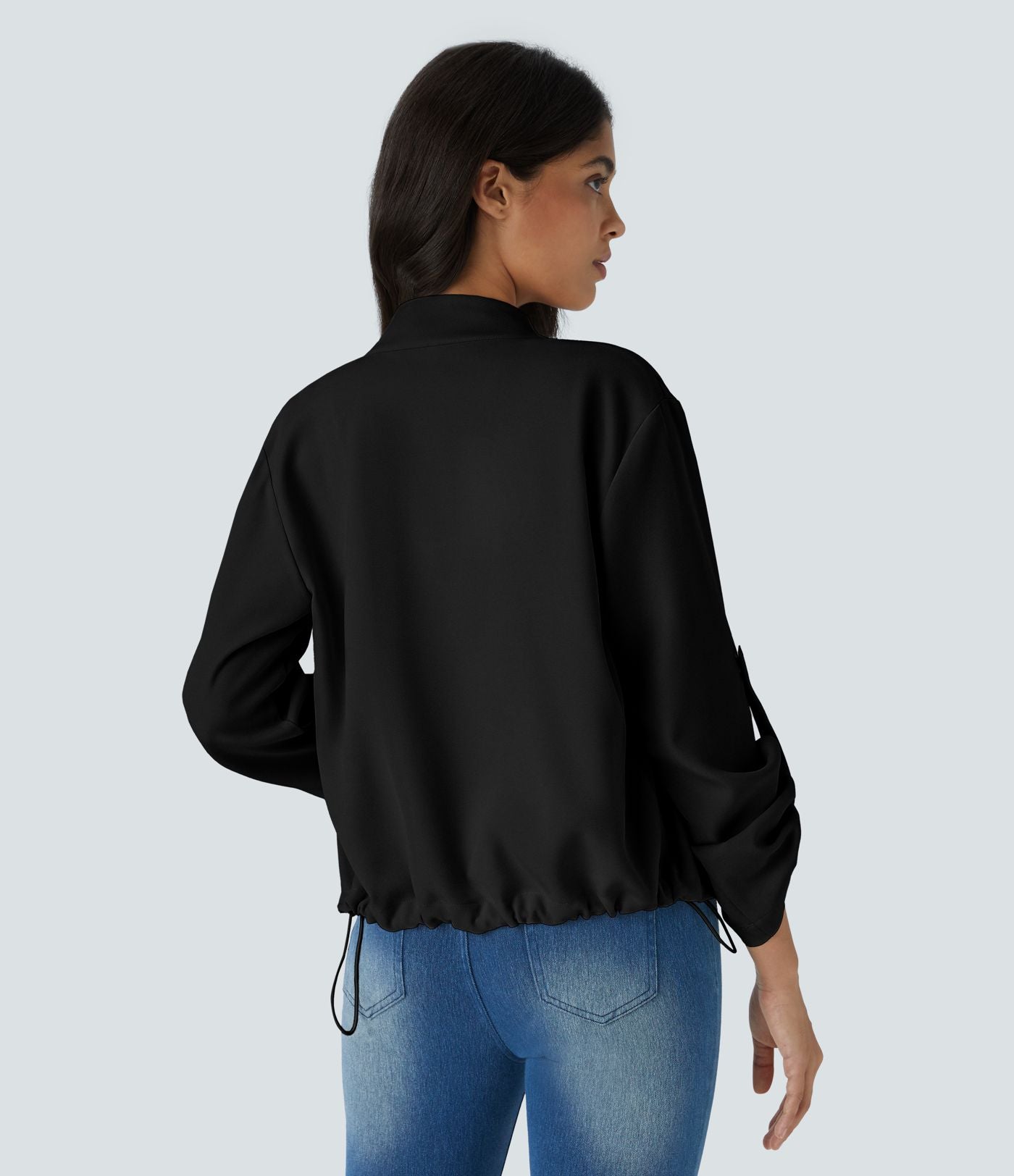 Blouson décontracté à col montant, manches retroussables, poches à rabat, cordon de serrage intérieur et fermeture éclair
