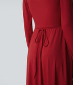 Robe mi-longue deux pièces à manches longues effet cache-cœur avec nœud au dos et poches