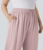 Pantalon décontracté grande taille large fluide taille haute effet lin avec cordon de serrage et poches