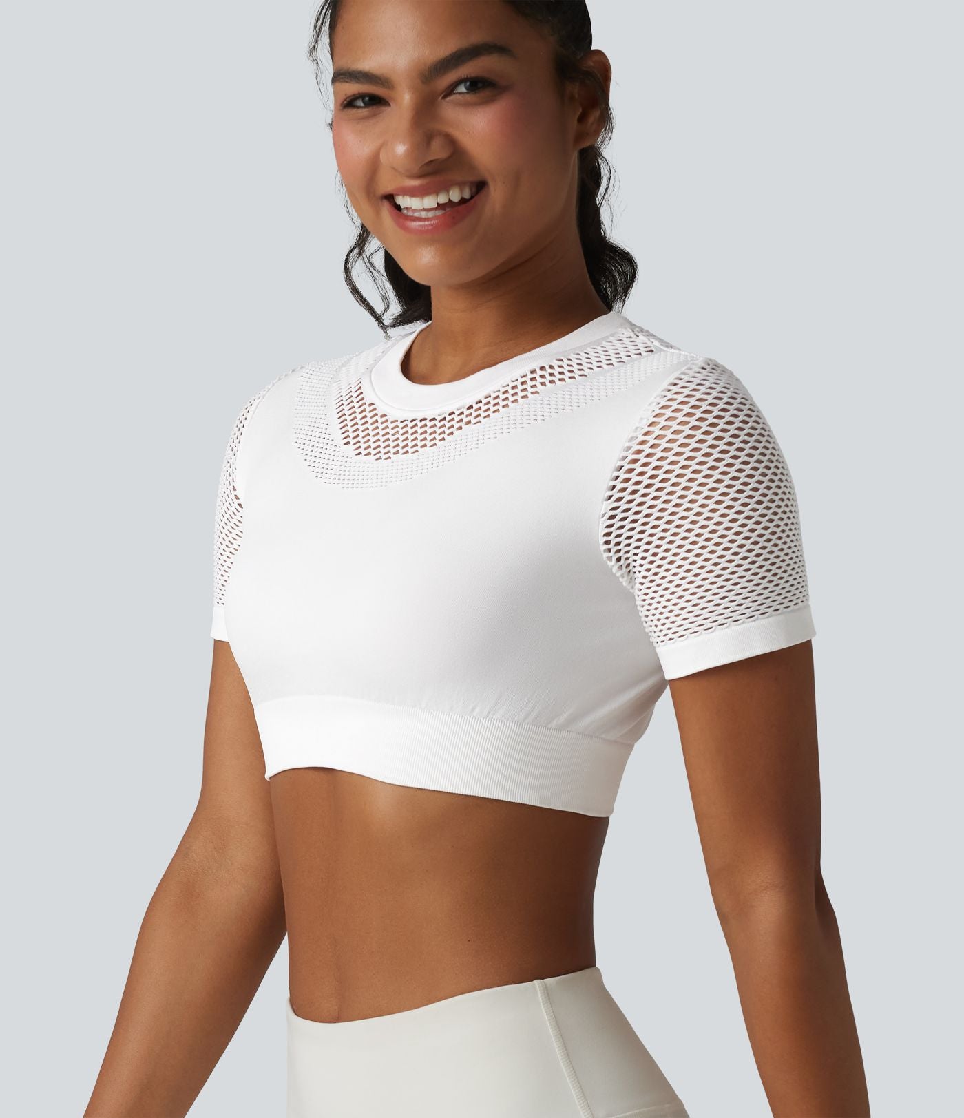 OneForm Seamless Flow Haut de sport crop col rond manches courtes avec découpes