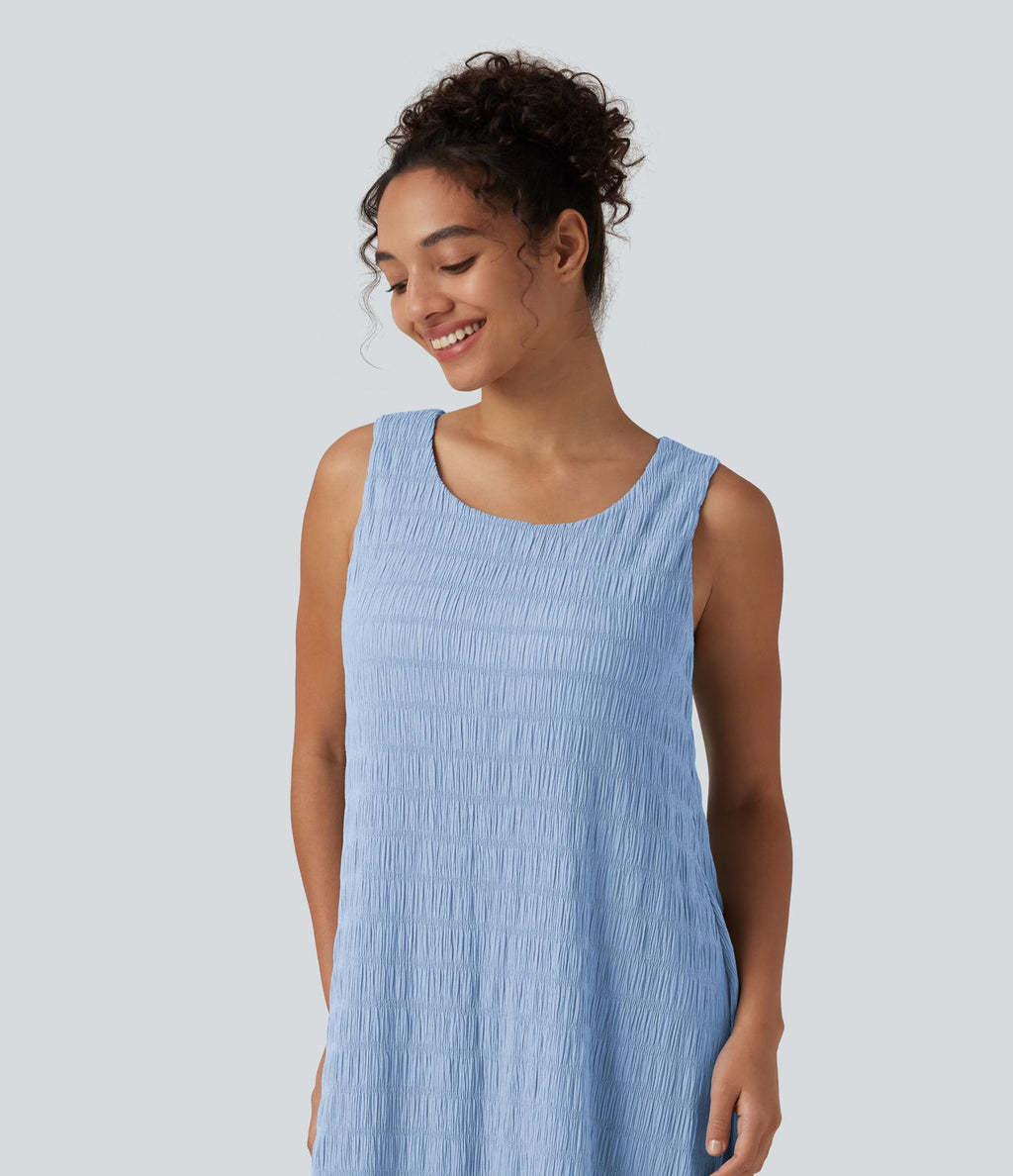 Robe midi sans manches à encolure arrondie avec coussinets amovibles et ourlet à volants