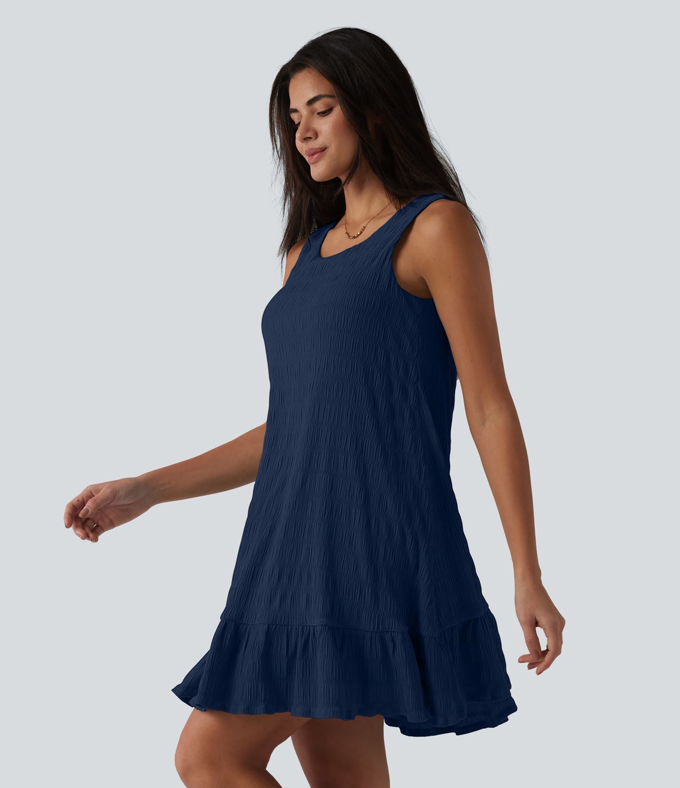 Robe courte décontractée sans manches à col rond, soutien-gorge intégré et ourlet à volants
