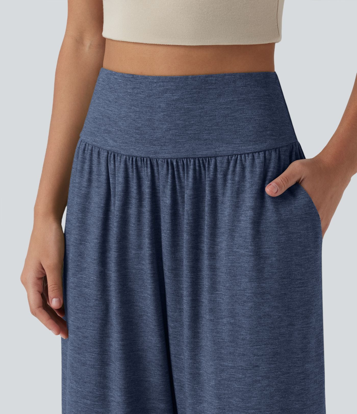 Pantalon décontracté taille haute gainant avec ourlet arrondi et poches