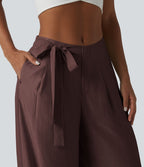 Pantalon large fluide taille haute en lin mélangé avec poches et liens latéraux
