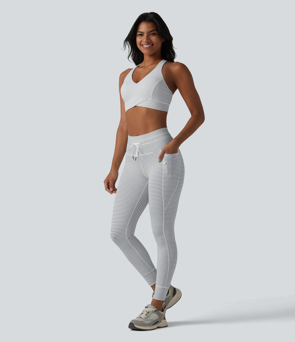 Brassière de sport col V dos nageur maintien moyen à rayures