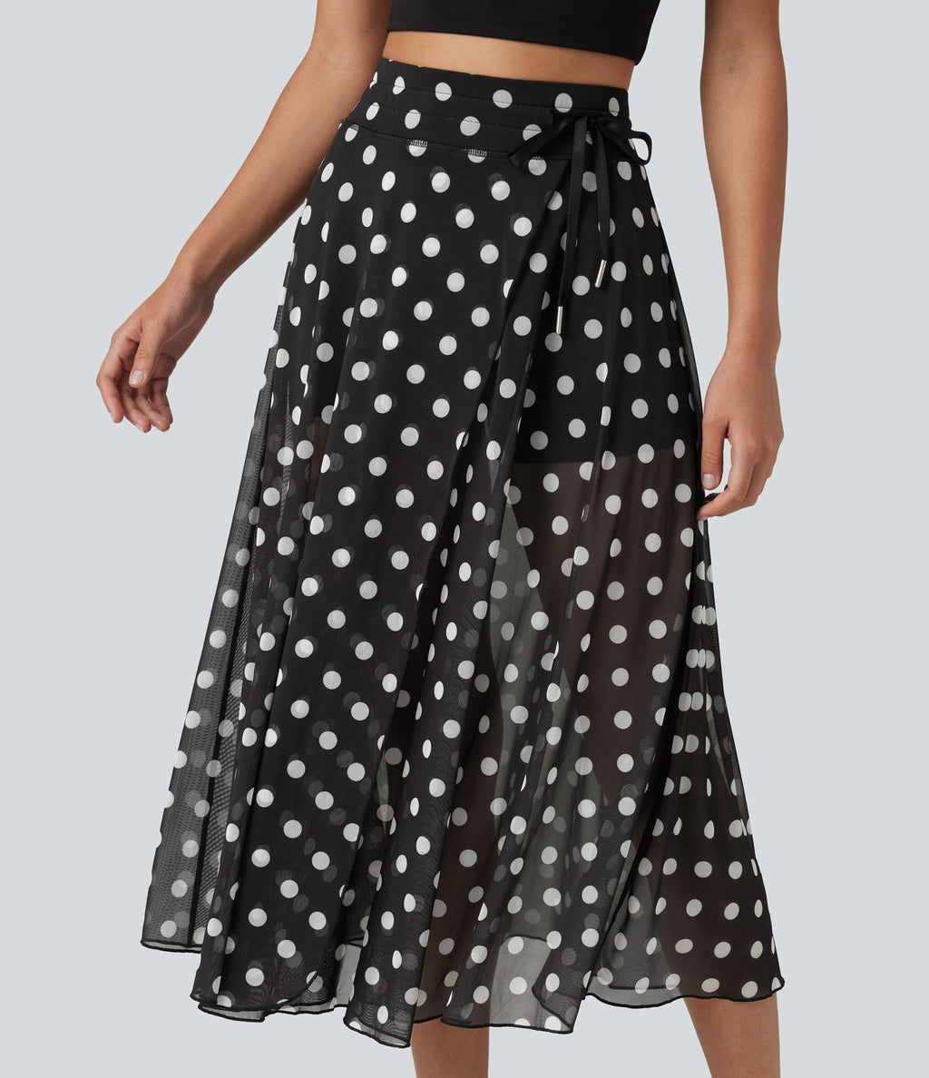 Jupe-short midi fluide évasée taille haute style vacances en mesh à pois avec cordon de serrage et poches