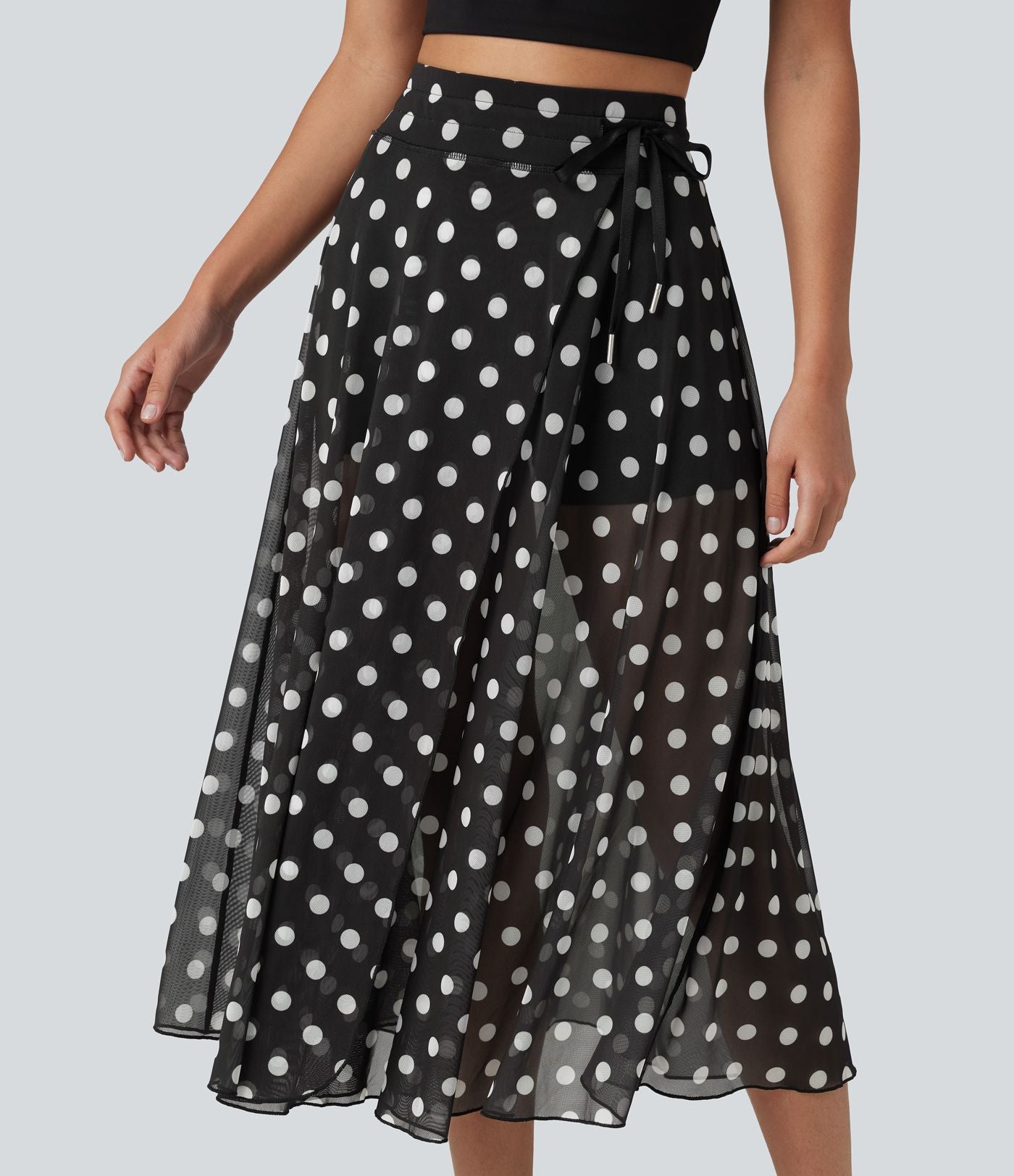 Jupe-short midi fluide évasée taille haute style vacances en mesh à pois avec cordon de serrage et poches
