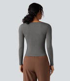 T-shirt tailleur col rond ourlet asymétrique manches longues