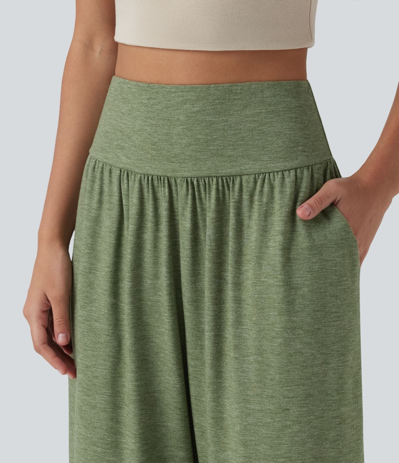 Pantalon décontracté taille haute gainant avec ourlet arrondi et poches