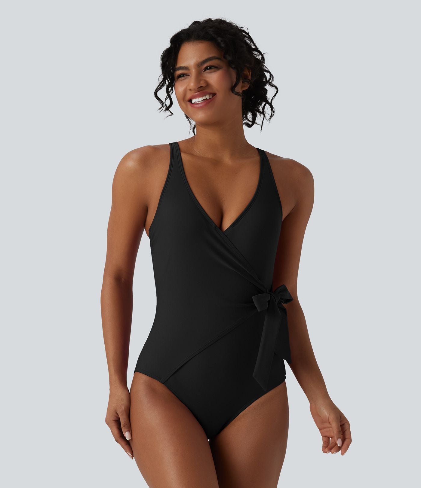 Maillot de bain une pièce gainant col V avec brassière intégrée et liens latéraux