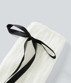 Jambières en maille avec nœud