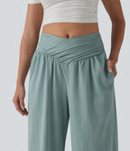 Pantalon baggy effet lin taille haute croisée avec détails froncés et poche