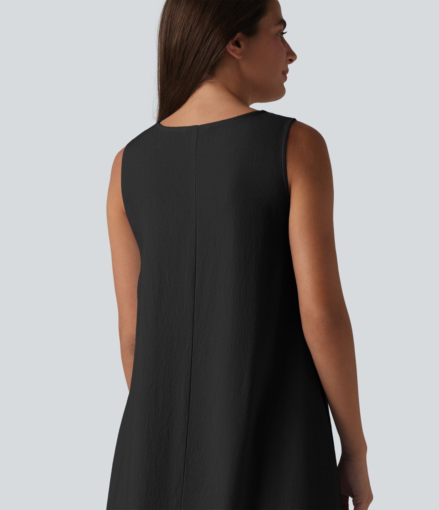 Robe débardeur midi unie sans manches à col rond et poches