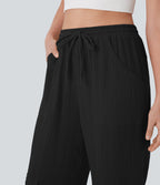 Pantalon cargo large fluide en coton taille haute avec cordon de serrage et poches