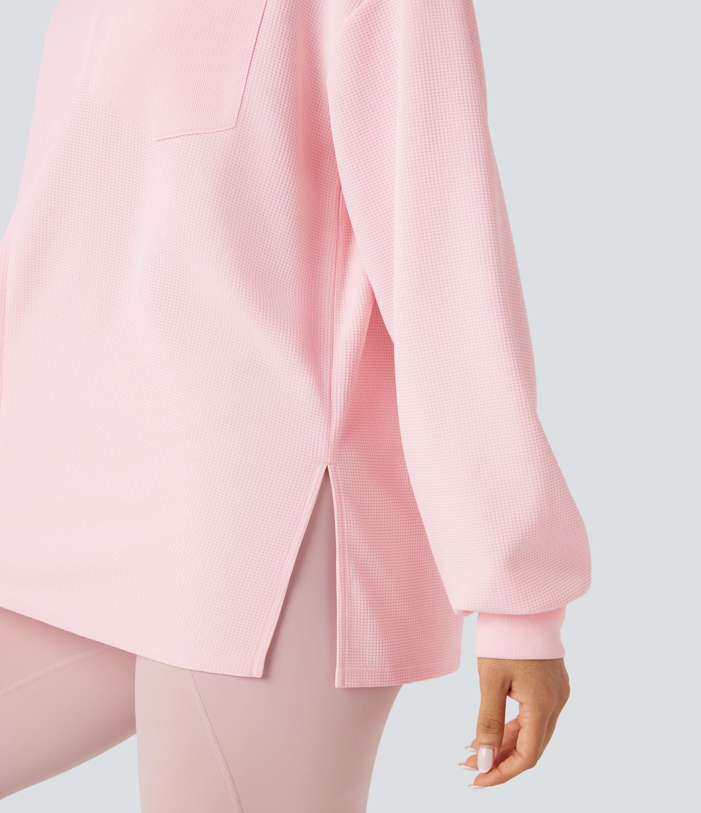 Sweat-shirt gaufré oversize col rond manches longues ourlet fendu avec poches