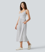 Robe fluide décontractée midi sans manches dos nu croisée à pois avec poches