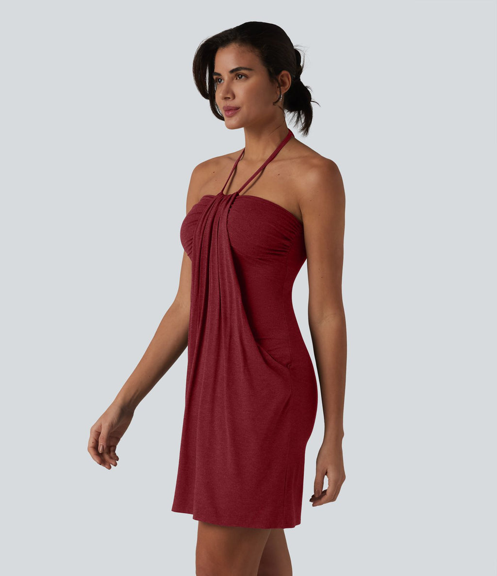 Robe resort mini dos nu à col licou avec lien noué dans le dos et poches