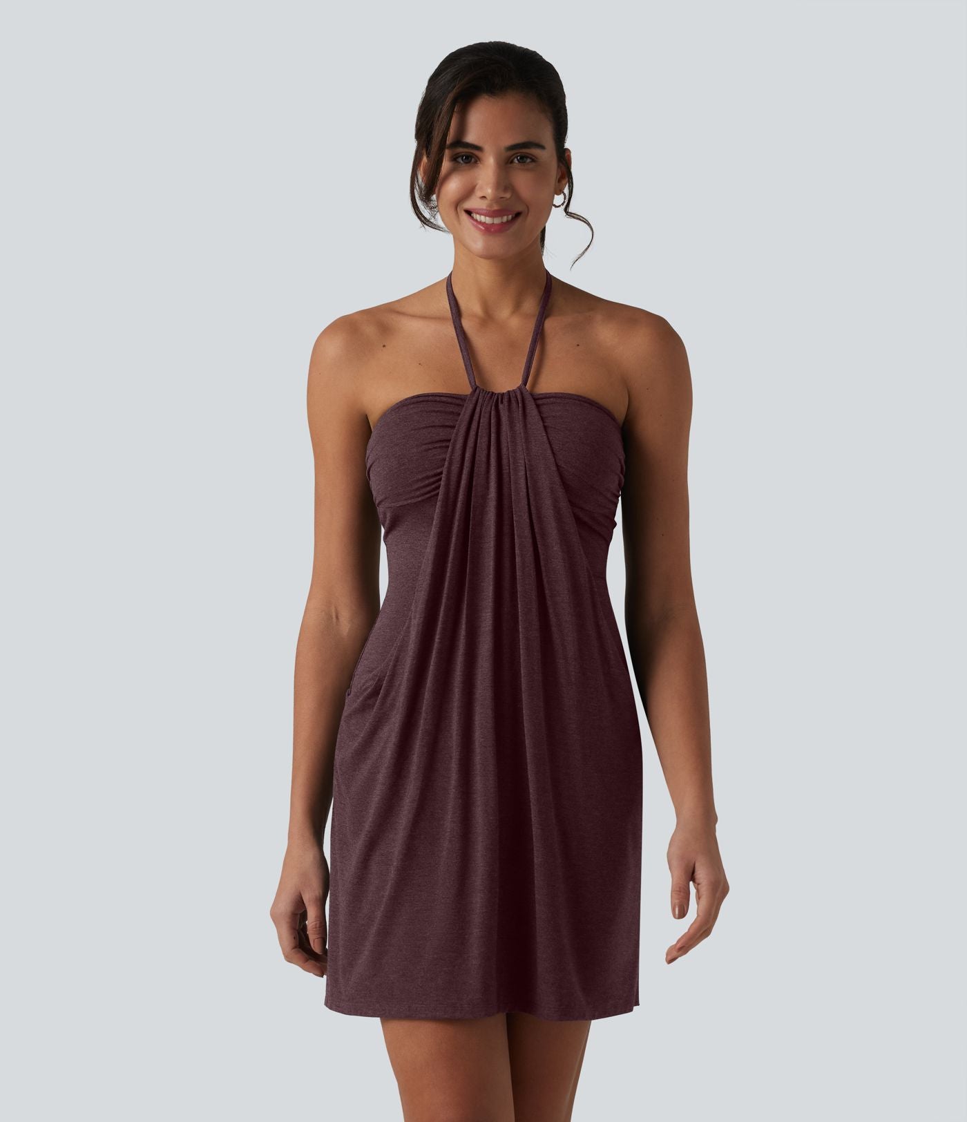Robe resort mini dos nu à col licou avec lien noué dans le dos et poches
