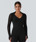 Top de sport yoga SoftlyZero™ Plush 2-en-1 mesh contrastant avec trous pouces