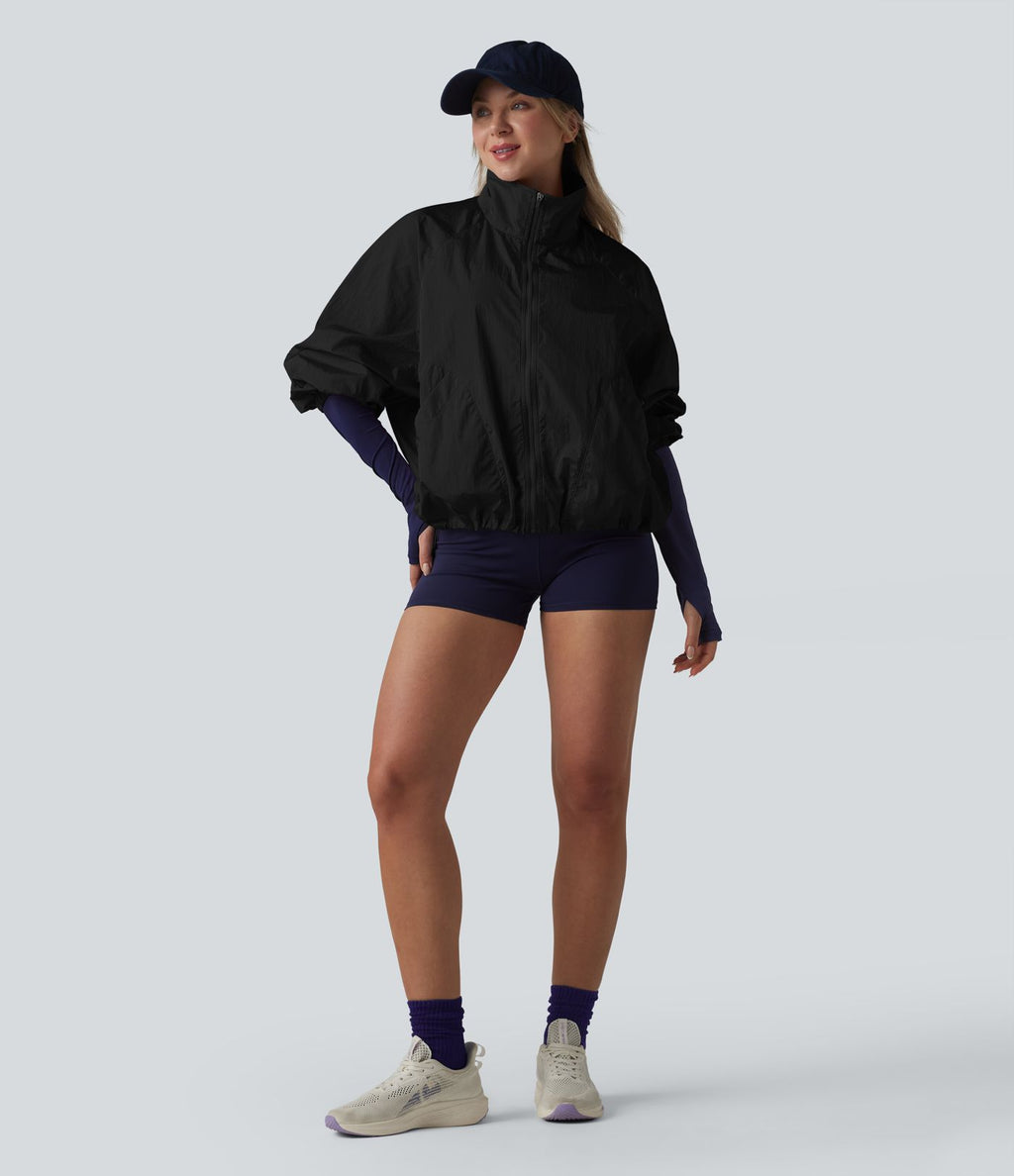 Veste de sport déperlante col montant manches longues zippée avec poches