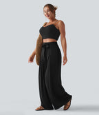 Pantalon large resort taille haute aspect lin avec nœud frontal et poches