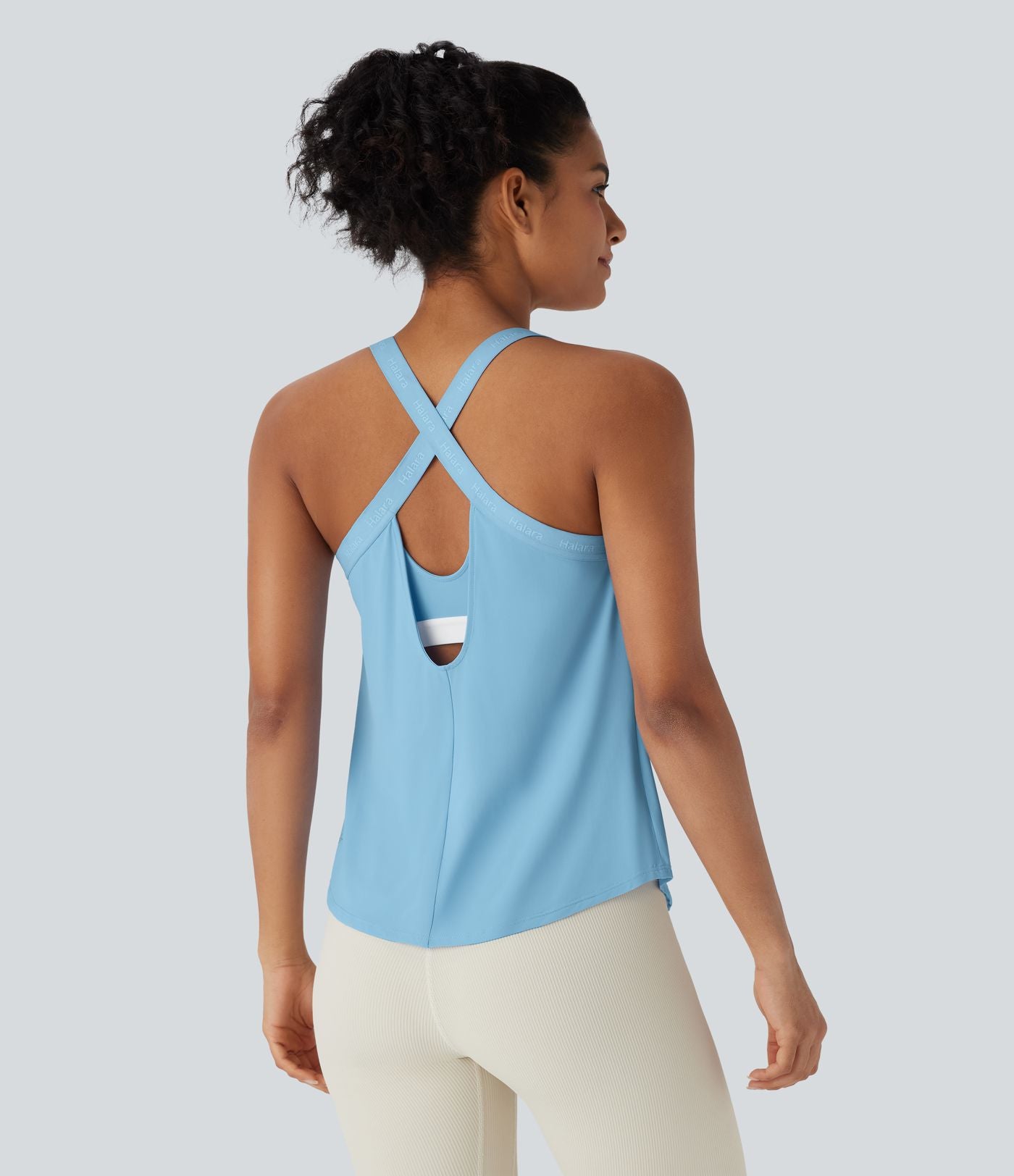 Débardeur yoga dos nu col U avec bretelles croisées, ourlet arrondi et effet frais InstantCool, protection solaire UPF50+