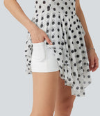 Robe mini à pois sans manches à col rond, avec superposition asymétrique et short amovible avec poche