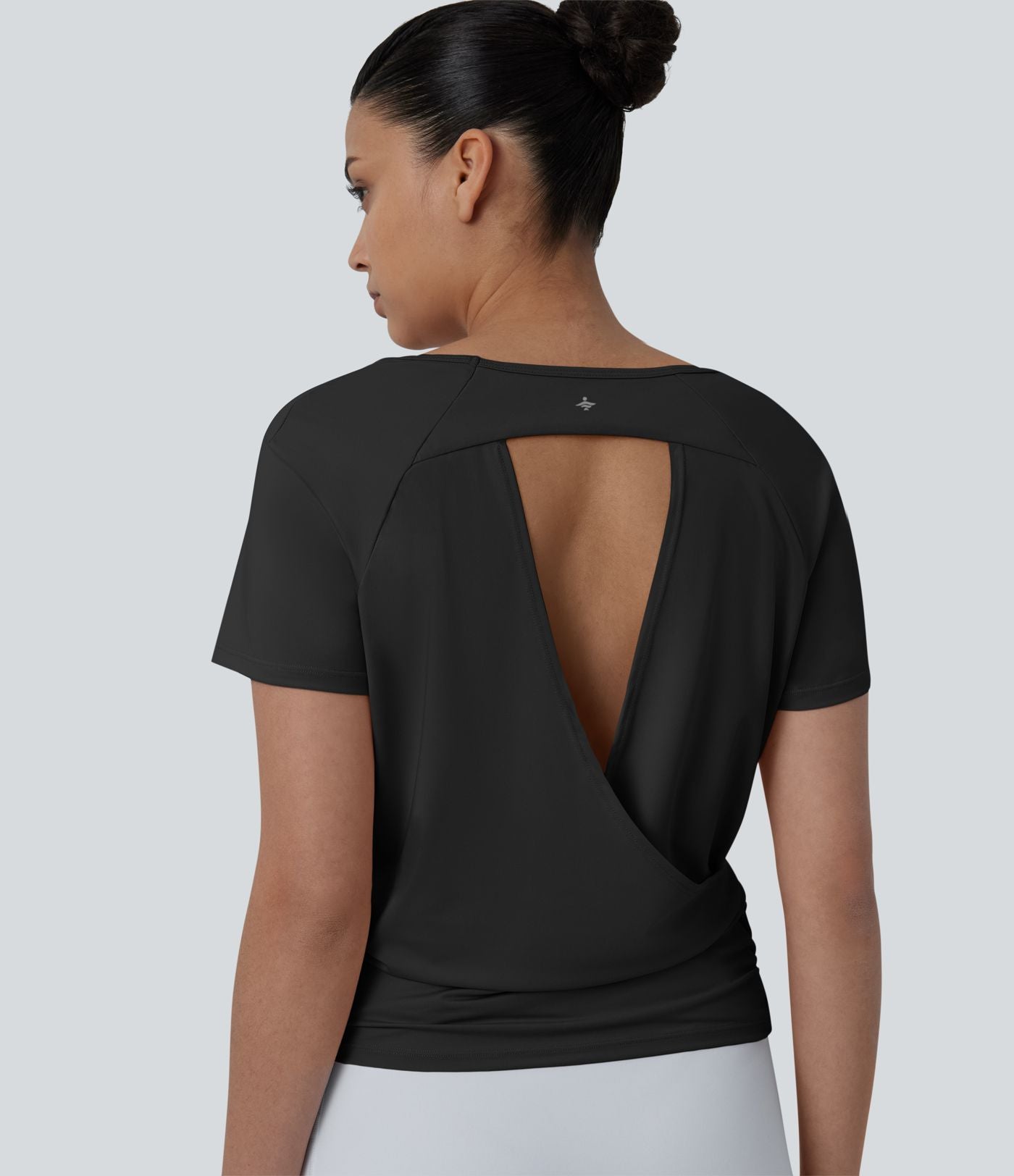 Haut sport yoga col rond manches raglan courtes dos découpé froncé