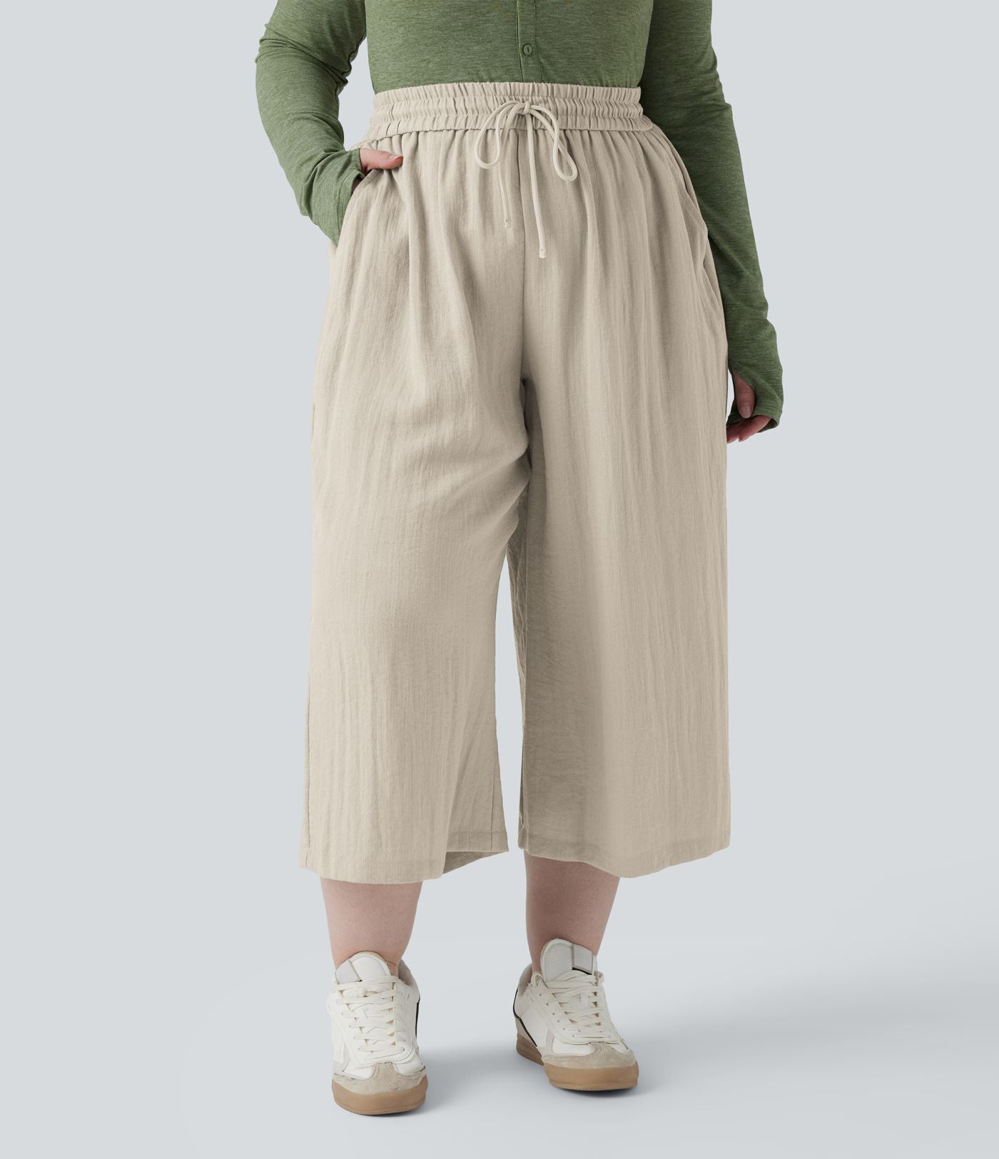 Pantalon grande taille large fluide taille haute avec cordon de serrage, poches et aspect lin