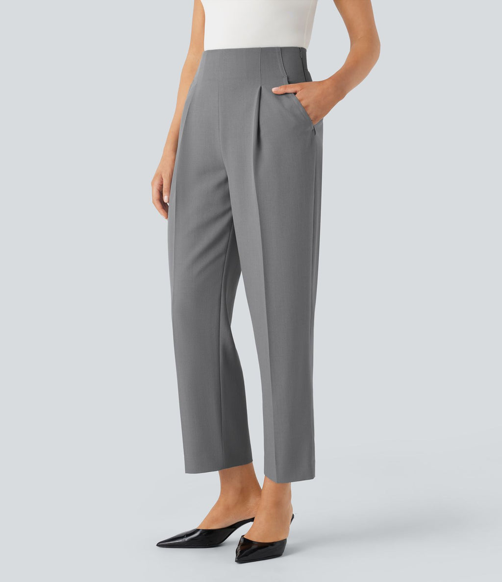 Pantalon tailleur taille haute froncé coupe fuselée avec poches et fermeture éclair invisible sur le côté