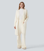 Robe d'intérieur longue tricot ouverte ceinturée manches longues avec poches