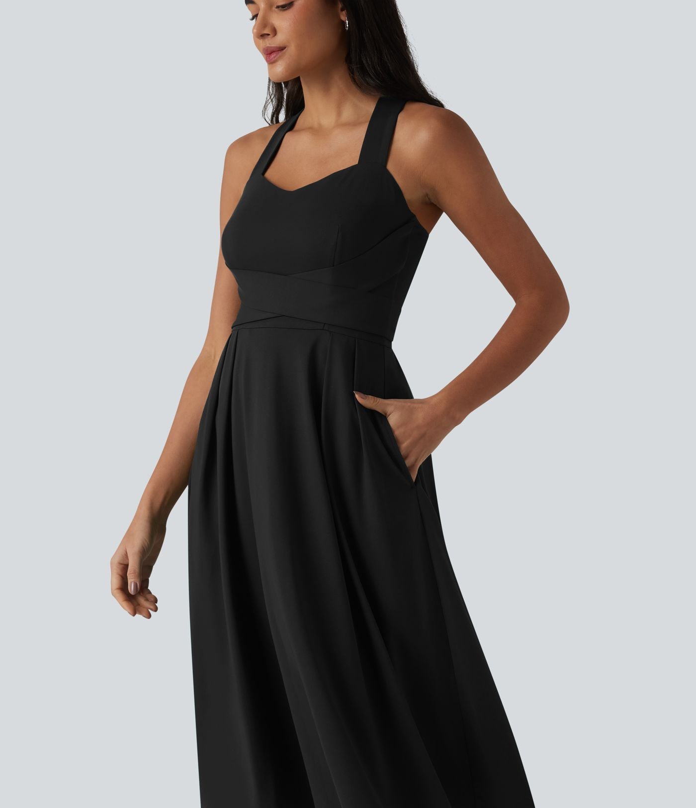 Robe midi fluide sans manches décolleté cœur avec bretelles croisées, nœud dans le dos et poches
