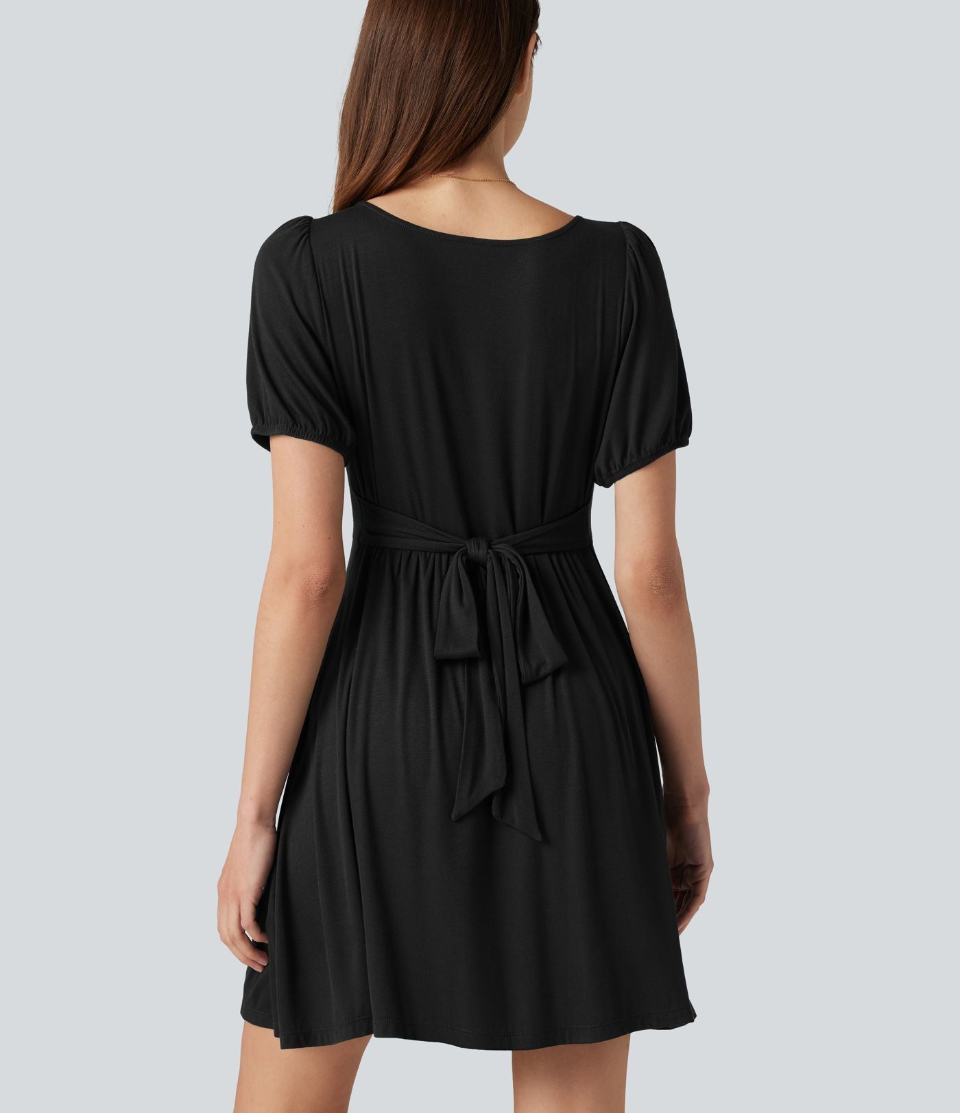 Robe décontractée mini col rond échancré manches courtes dos noué avec poches