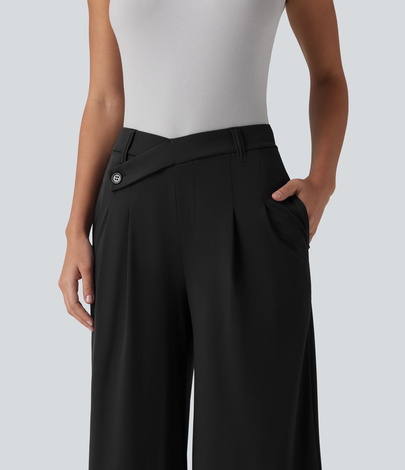 Pantalon tailleur évasé asymétrique taille mi-haute avec poches